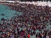 Ljudi kao sardine: Na ovoj plaži igla nema gde da padne (VIDEO)